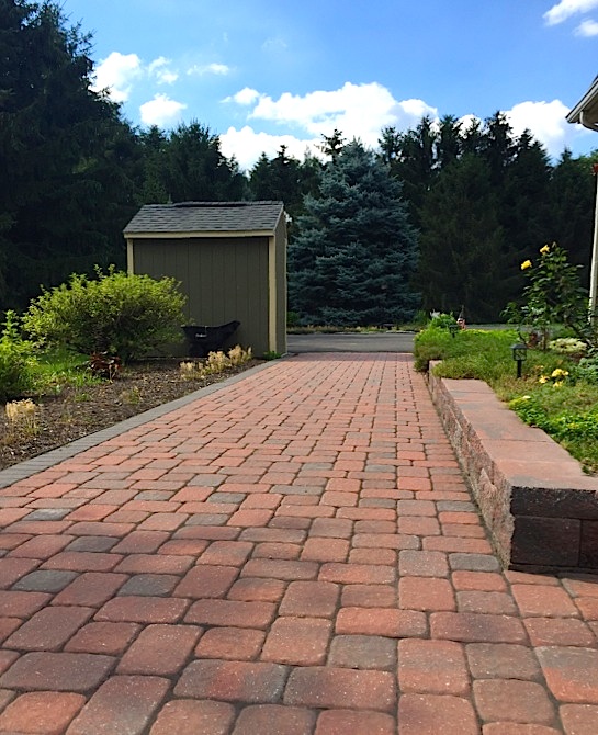 Stone paver walkway and garden wall